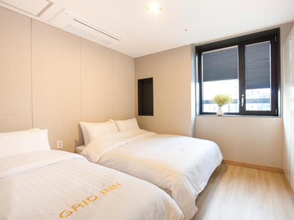 Grid Inn Hotel : photo 2 de la chambre studio familial