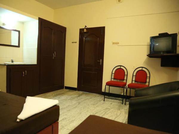 Rmc travellers inn : photo 3 de la chambre chambre quadruple confort