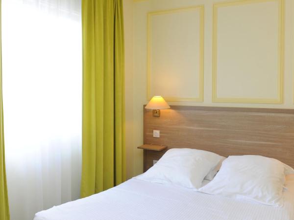 Hôtel Beau Rivage : photo 4 de la chambre chambre double avec douche - vue sur cour
