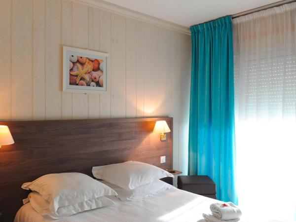 Hôtel Beau Rivage : photo 1 de la chambre chambre double ou lits jumeaux avec balcon - vue sur mer