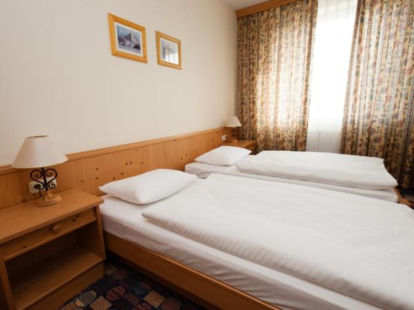 Hotel Partner : photo 7 de la chambre chambre quadruple confort