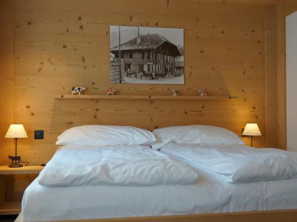 Posthotel Rössli : photo 8 de la chambre chambre double supérieure avec balcon ou terrasse