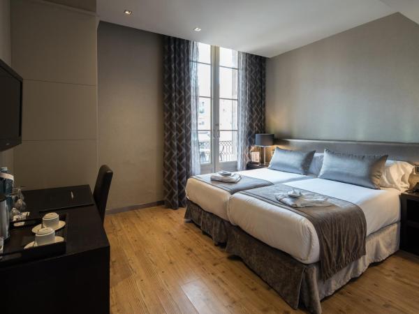 Catalonia Portal de l'Angel : photo 3 de la chambre chambre double ou lits jumeaux avec terrasse