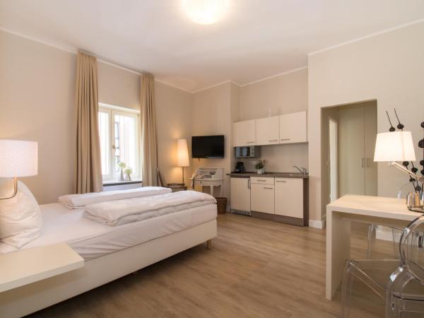 Living am Carlsplatz : photo 9 de la chambre chambre double