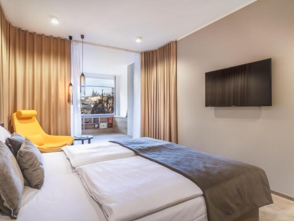 The President : photo 5 de la chambre chambre double ou lits jumeaux de luxe - vue sur château