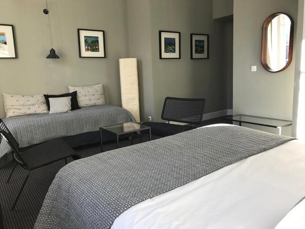 Hotel Spa Azteca Barcelonnette : photo 4 de la chambre grande chambre triple