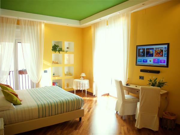 Il Giardino Segreto : photo 7 de la chambre chambre double ou lits jumeaux supérieure - vue sur jardin