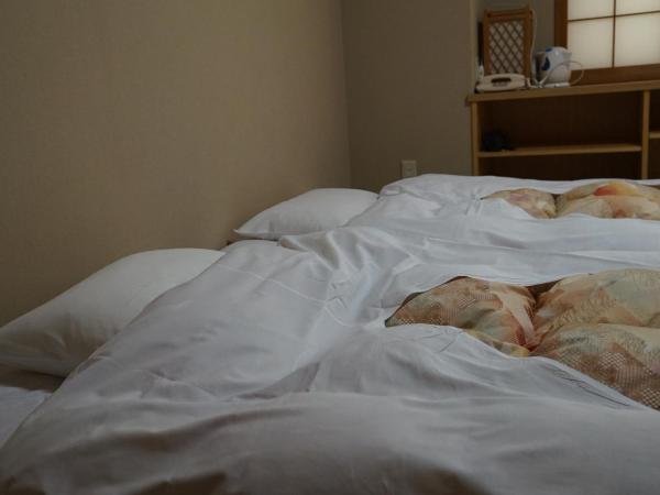 Annex Katsutaro Ryokan : photo 1 de la chambre chambre lits jumeaux deluxe de style japonais