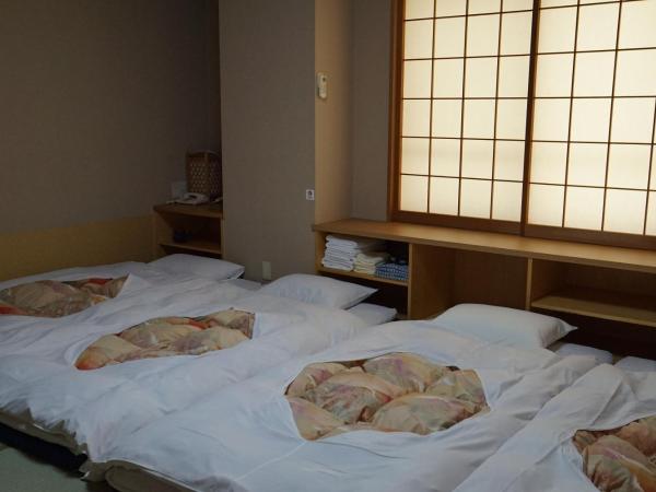 Annex Katsutaro Ryokan : photo 2 de la chambre chambre quadruple de style japonais
