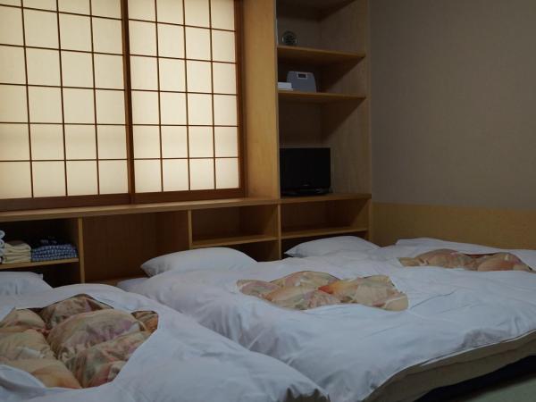 Annex Katsutaro Ryokan : photo 1 de la chambre chambre quadruple de style japonais