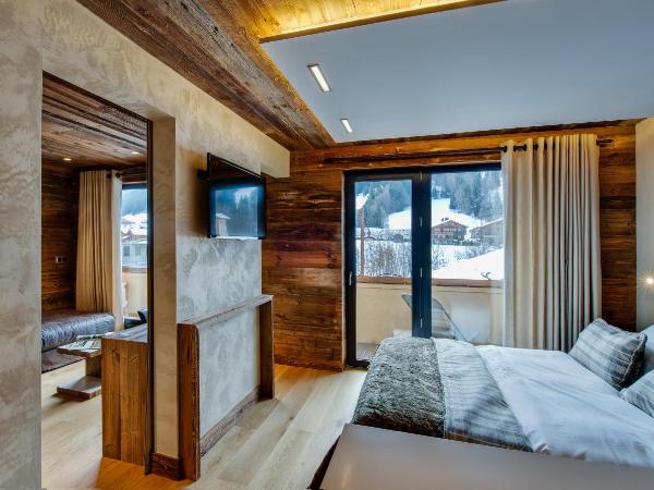 Hôtel-Chalet Les Ecureuils Restaurant, Sauna & Spa Garage : photo 3 de la chambre suite avec balcon