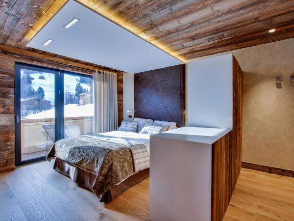 Hôtel-Chalet Les Ecureuils Restaurant, Sauna & Spa Garage : photo 5 de la chambre suite avec balcon