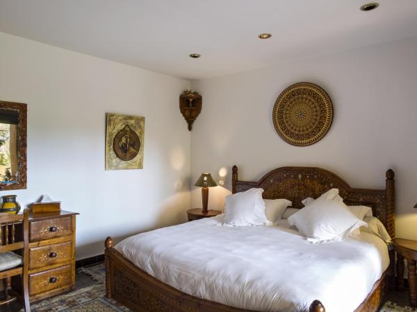 Villa Quieta : photo 3 de la chambre suite - vue sur jardin