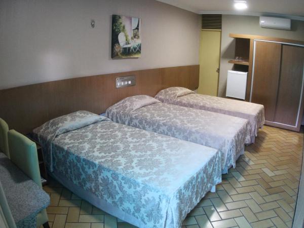 Amuarama Hotel : photo 2 de la chambre chambre triple exécutive