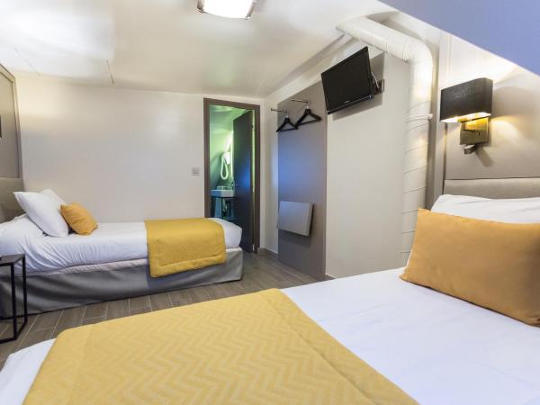 Pratic Hotel : photo 2 de la chambre chambre lits jumeaux