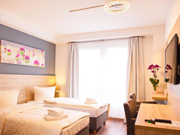 BlnCty Hotel : photo 3 de la chambre chambre lits jumeaux confort