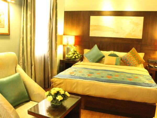 juSTa MG Road : photo 7 de la chambre suite