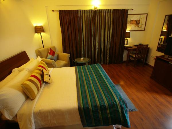juSTa Off MG Road : photo 5 de la chambre chambre deluxe