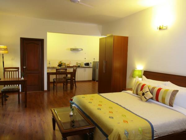 juSTa Off MG Road : photo 3 de la chambre chambre deluxe
