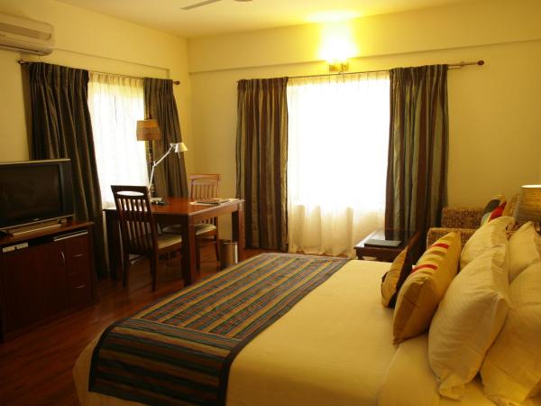 juSTa Off MG Road : photo 4 de la chambre chambre deluxe