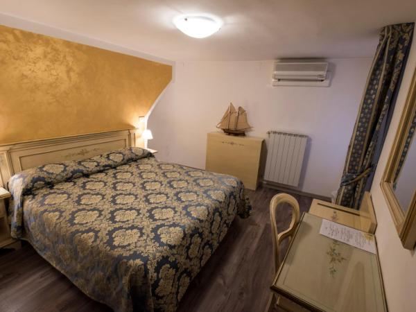 Albergo Casa Peron : photo 7 de la chambre chambre double ou lits jumeaux avec salle de bains privative