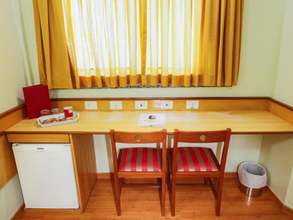 Scorial Rio Hotel : photo 5 de la chambre chambre triple de luxe (1 lit double + 1 lit simple)