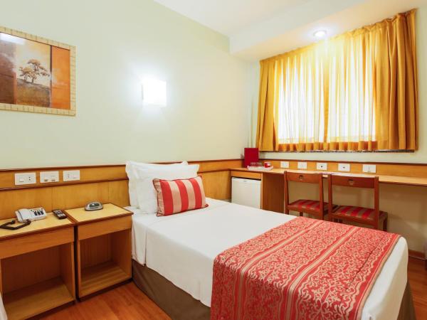 Scorial Rio Hotel : photo 6 de la chambre chambre triple de luxe (1 lit double + 1 lit simple)