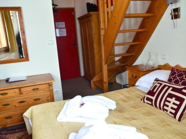 Hôtel et Chalet Au Coin Du Feu Chilly Powder : photo 1 de la chambre chambre familiale standard en duplex