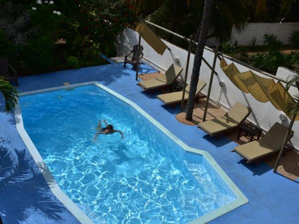 Villa Osumare Guest House : photo 10 de la chambre grande chambre double 