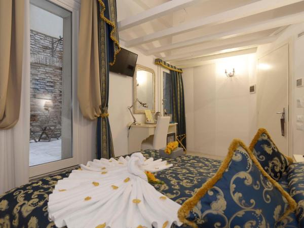 Al Mascaron Ridente : photo 1 de la chambre chambre double ou lits jumeaux