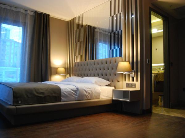 The City Suites : photo 4 de la chambre chambre deluxe