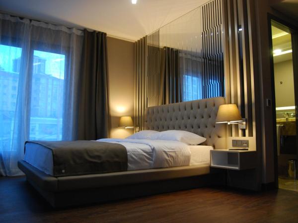 The City Suites : photo 6 de la chambre chambre deluxe
