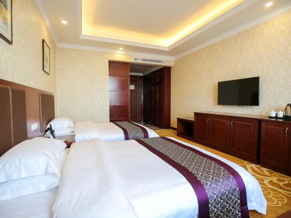 New Knight Royal Hotel Airport and International Resort : photo 4 de la chambre chambre deluxe avec 2 lits doubles