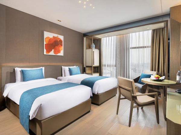 Novotel Shanghai Clover : photo 5 de la chambre chambre lits jumeaux premier
