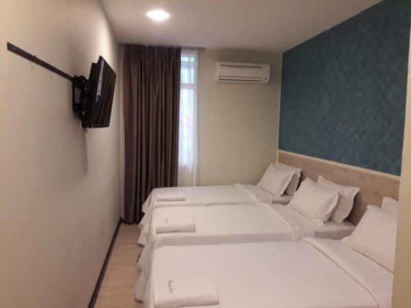 Pantai Inn Kota Kinabalu : photo 8 de la chambre chambre triple