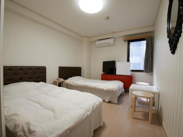 Hotel Empire in Shinjuku : photo 1 de la chambre chambre lits jumeaux