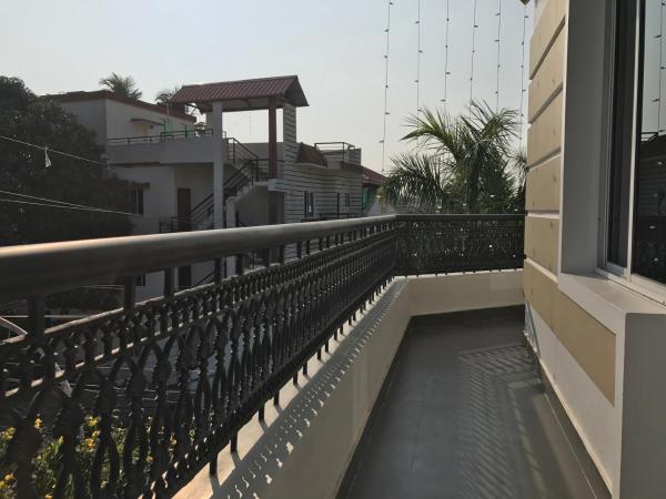 Daffodils Spice Court : photo 9 de la chambre chambre double avec balcon (2 adultes + 1 enfant)