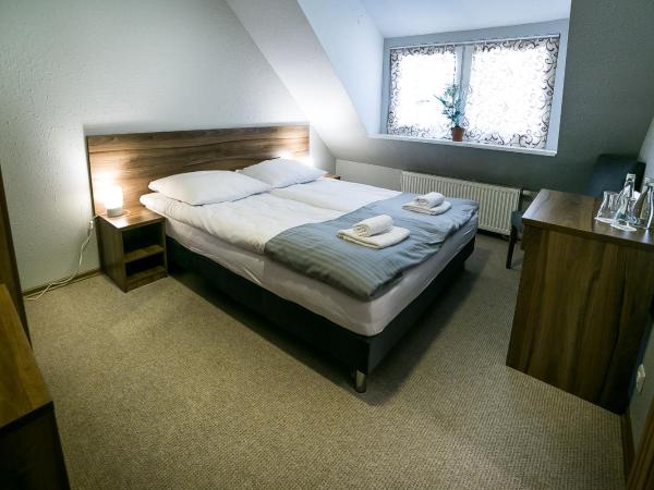 Gościniec Lizawka : photo 2 de la chambre chambre lit king-size - vue sur jardin