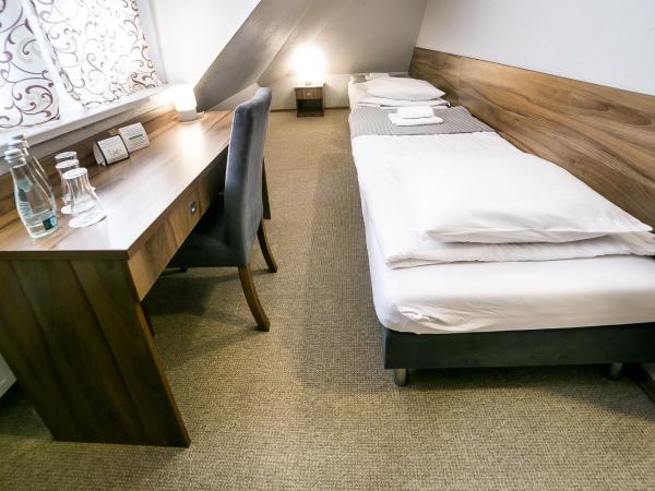 Gościniec Lizawka : photo 2 de la chambre chambre triple - vue sur jardin