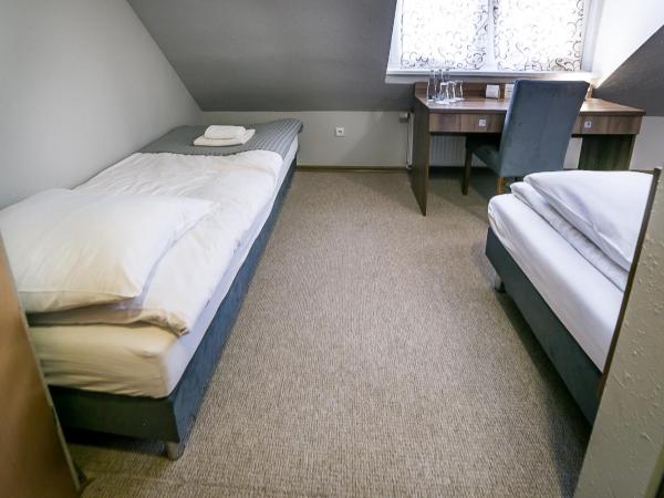 Gościniec Lizawka : photo 4 de la chambre chambre triple - vue sur jardin