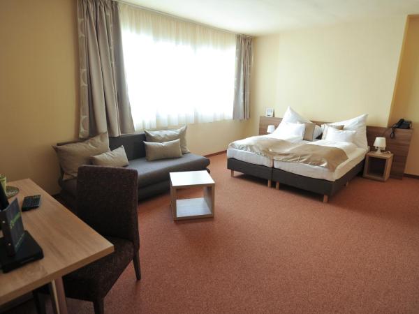 Centrooms Eger : photo 6 de la chambre chambre triple standard