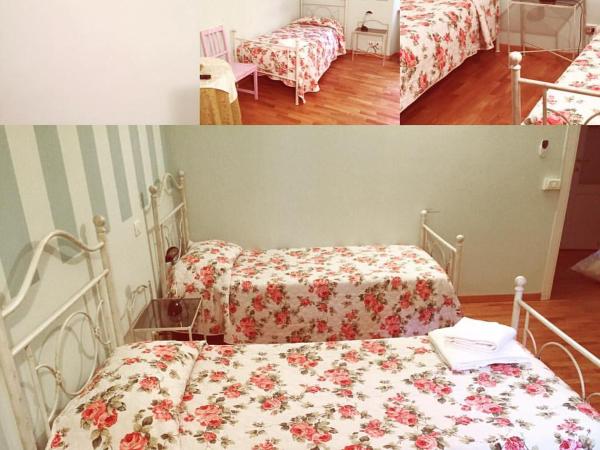 City's House Guest House : photo 1 de la chambre chambre triple avec salle de bains commune