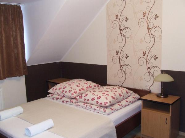 Péterfia Panzió : photo 10 de la chambre chambre double ou lits jumeaux