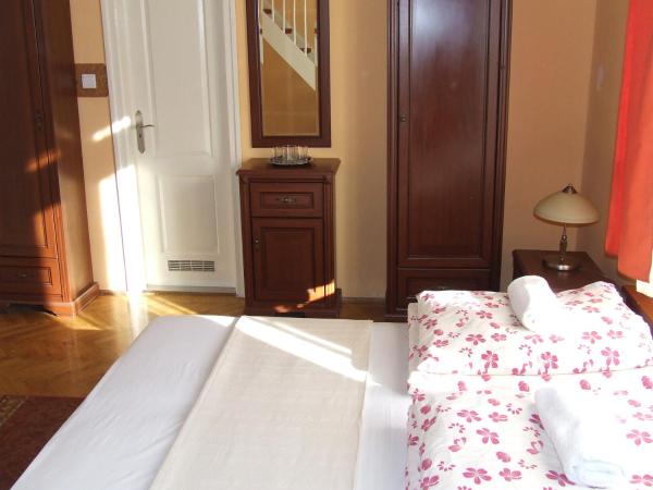 Péterfia Panzió : photo 1 de la chambre chambre double ou lits jumeaux