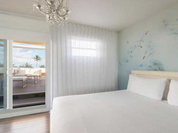 Penguin Hotel : photo 7 de la chambre chambre lit king-size avec terrasse - côté océan 