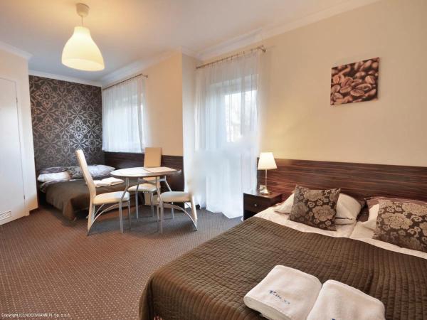 Villa 33 Blisko Plaży : photo 9 de la chambre chambre quadruple