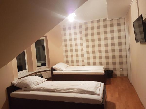 Duszka Hostel : photo 2 de la chambre chambre quadruple Économique avec salle de bains commune