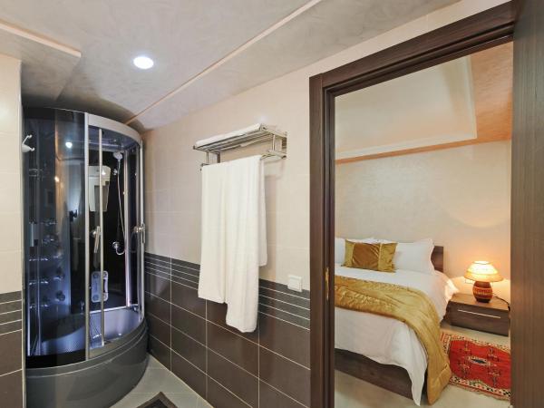 Aparthotel Les Oliviers Suites & Spa : photo 3 de la chambre appartement en duplex