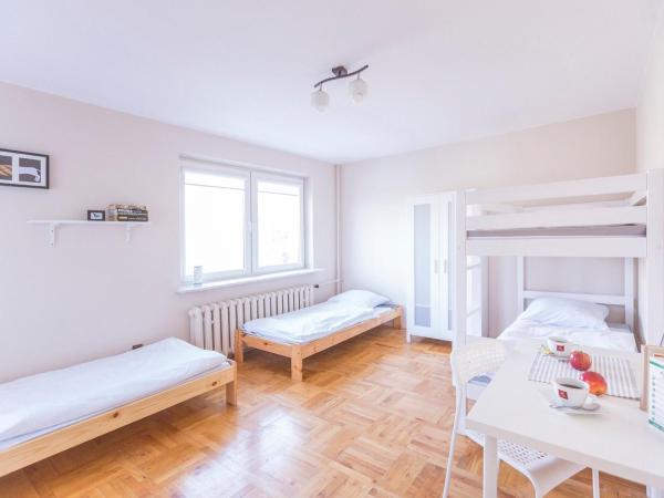 Kujawska Rooms : photo 1 de la chambre chambre triple avec balcon