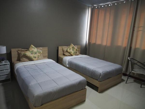 Sriyanar Place : photo 6 de la chambre chambre lits jumeaux - vue sur jardin